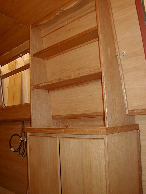 Barry built a lovely welsh dresser. The drawers are hidden behind the cupboard doors. The scalloped top looks great.