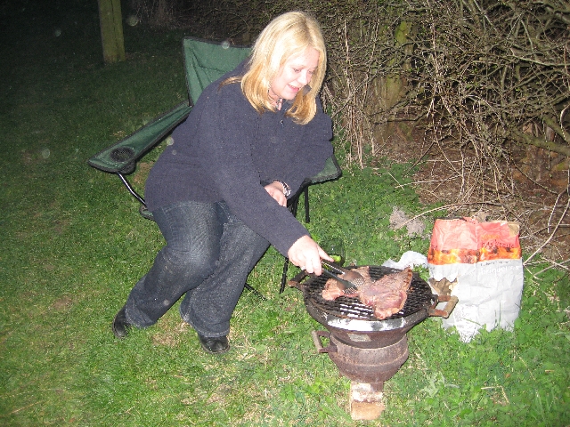 Liz mans the BBQ, cooking beautiful rump steak from our butcher in Nether Heyford.