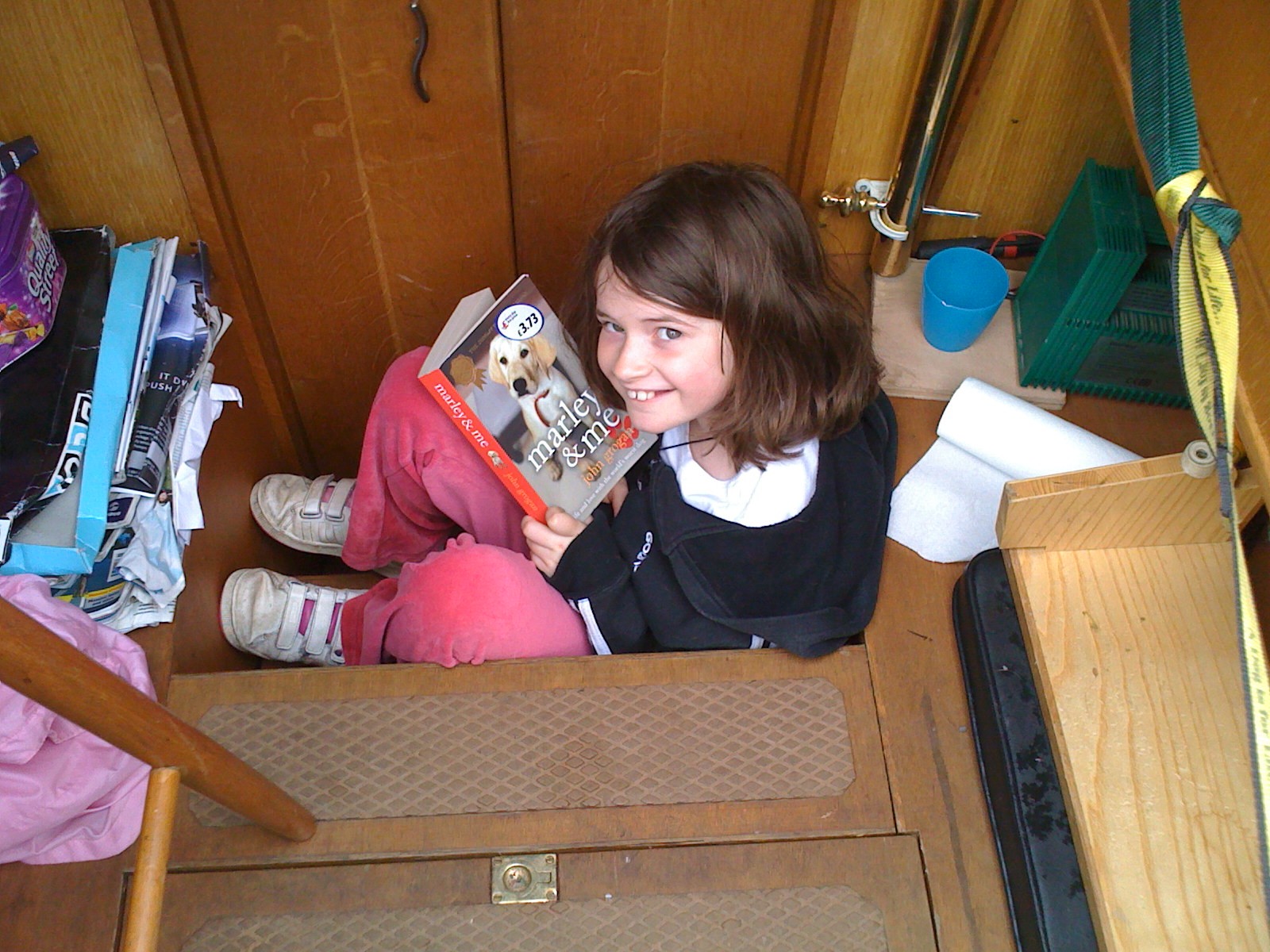 Anna reading Marley and Me