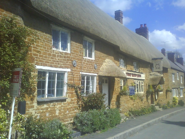 On May Day we walked around Cropredy. This stone cottage was near to a pub.